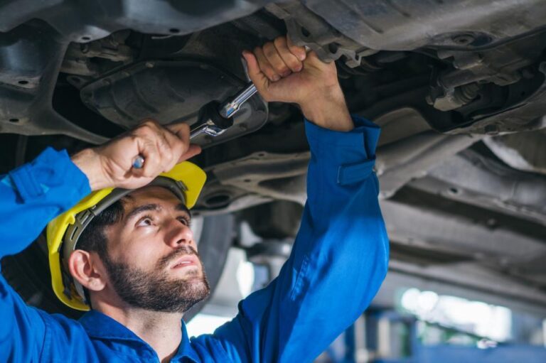 mechanic-repairing-car-damage-at-auto-shop (1)